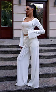 Костюм Poliit білий 36, 38 розміри з трикотажу — топ з розкльошеними рукавами та штани палаццо