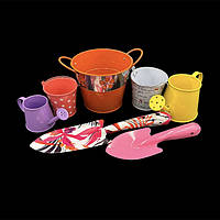 Декоративні металеві відра, поливалка, лопатка садова.