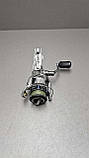 Рибальська спінінгова котушка Б/У Shimano Stradic 1000 H, фото 3