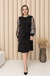 Жіноча сукня чорна джерсі ошатна з вишивкою та рукавами з сітки батал