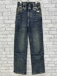 Стильні прямі жіночі джинси в темно-синьому брудному кольорі на гумці