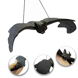 Летюча миша гумова велика – іграшка та декор на Хелловін