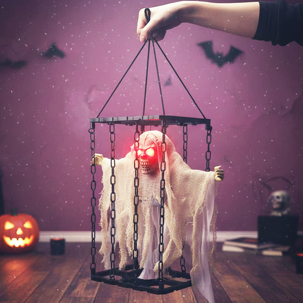Підвісний декор Скелет у клітці з підсвічуванням та звуками, 40х23 см, 01-13-89 / Анімований декор на Хелловін, фото 1