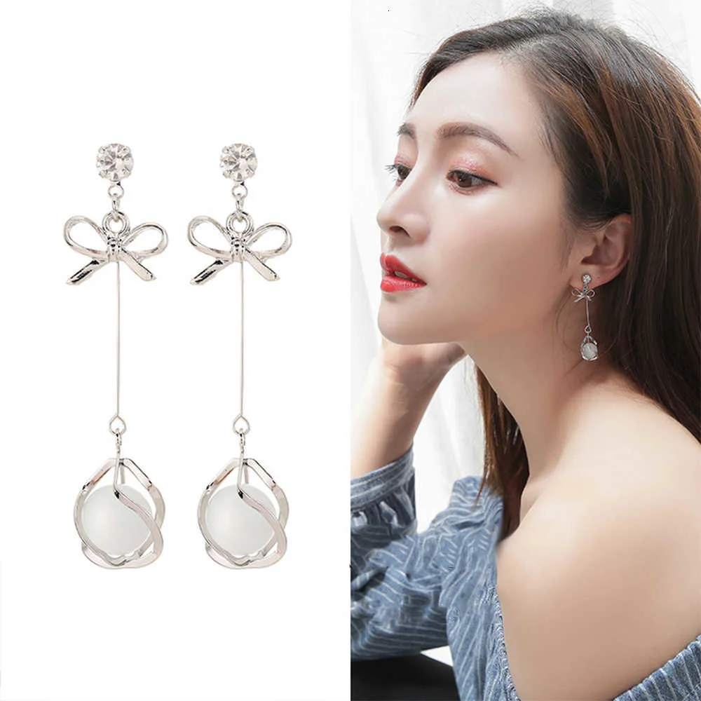 Сережки з бантом опалові довгі сережки-краплі, фото 1