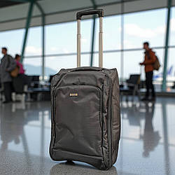 Маленька тканинна валіза на колесах 53х31х20 см сіра 2 колеса, ручна поклажа