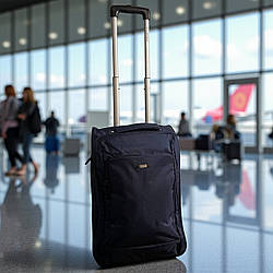 Маленька валіза для ручної поклажі Filippini синя 53х31х20 см