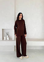 Жіночий в'язаний костюм двійка зі светром і широкими штанами