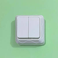 Вимикач подвійний накладний