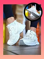 Жіночі зимові білі кросівки на хутрі спортивного стилю Violeta