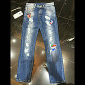 Модні рвані джинси на хлопчика з нашивками Boy