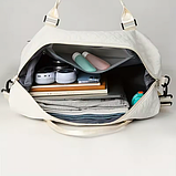 Спортивна дорожня сумка 50×24×36 см з відділом для взуття та косметичкою 25×14×7 см ручкою та кишенями біла, фото 3