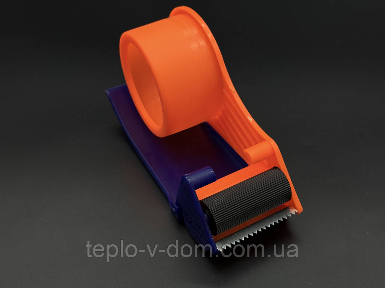 Диспенсер для скотча пластиковий.