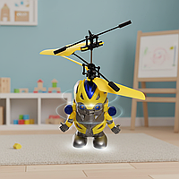 Робот літаючий іграшковий жовтий, інтерактивна іграшка з датчиком руки для дітей