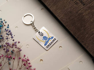 Брелок металевий з УФ-друком. "Ukraine" 30х40мм.
