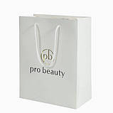 Пакет брендований з білим шнурком 25×35×9 см Ламінований білий папір 200 г/м² Матова поверхня, фото 5