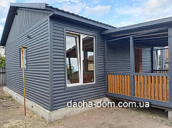 Каркасний будинок будинок 7*10 м з террасой, металичне оздоблення