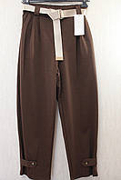 Жіночі штани з гудзиком знизу