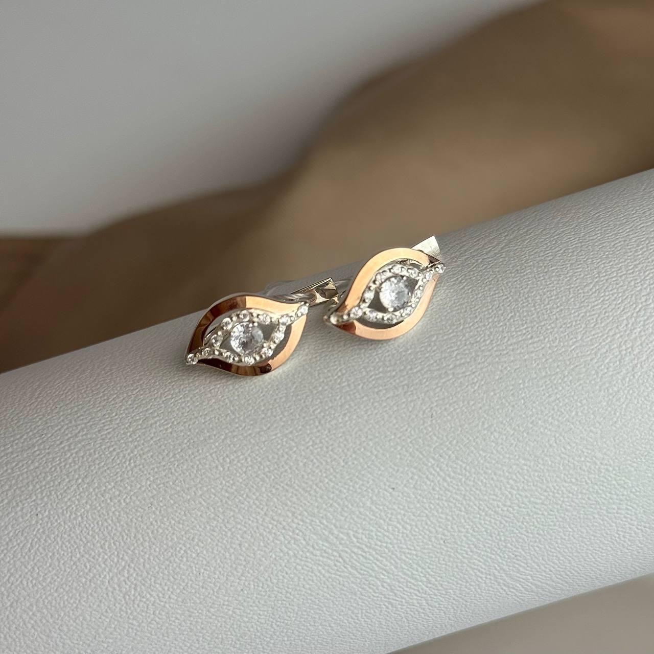 Срібні сережки з золотими вставками