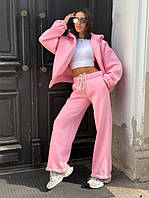 Спортивні костюми та комбінезони