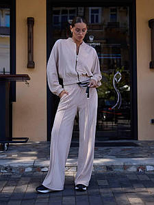 Велюровий жіночий костюм-бомбер з широкими штанами, бежевий — Poliit, розмір 36