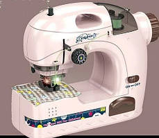Іграшкова швейна машинка на батарейках. Шиє нитками по тканині 6783A
