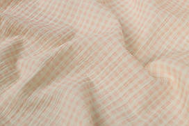 Муслін жатка Дрібна персиково-рожева клітинка 135 см