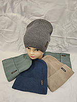 Шапка підліткова в'язана на флісі з бубоном