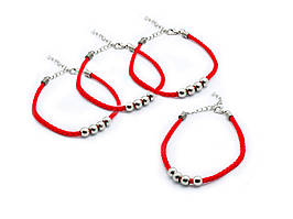 Червона нитка на руку на застібці