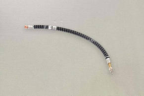 Шланг-підкачування внутрішнього колеса МАЗ КАМАЗ у пружині (подовжувач вентиля) (11-3116010-02) 01311051434