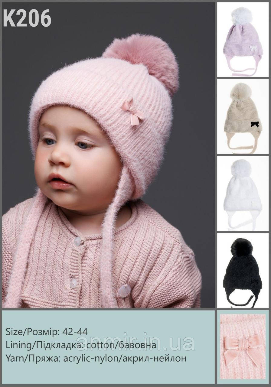 Шапка дитяча зимова на зав'язках із помпонами БАНТИК акрил-нейлон розмір 42-44, кольору міксом