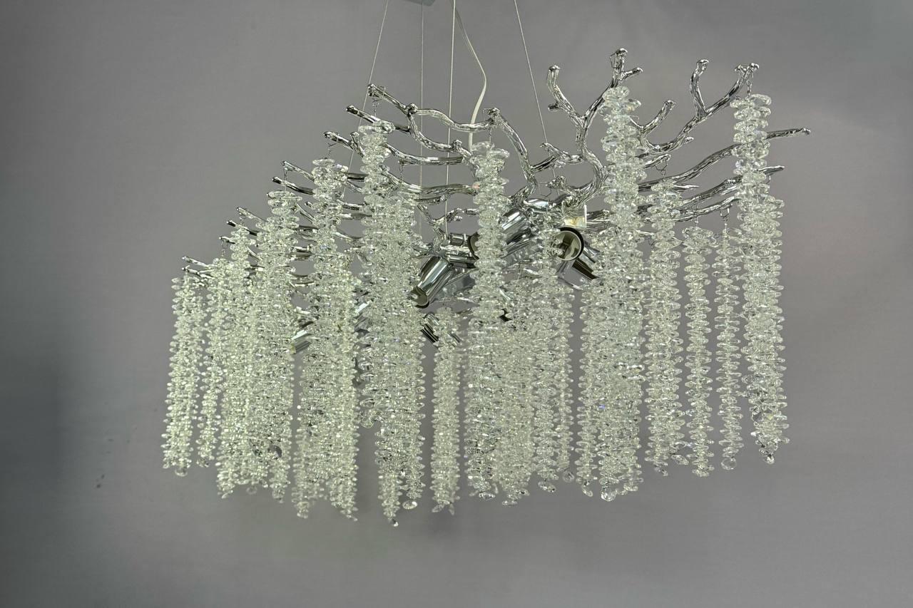 Срібляста люстра з кришталевими каскадами 10 ламп цоколь E14 регульований підвіс