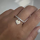 Тоненька каблучка-доріжка з цирконієм і підвісним сердечком "Glitter", фото 6