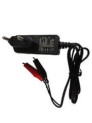 Зарядний пристрій АКБ 12V 1А дворежимний імпульсний 85х30х100mm OUTDO чорний