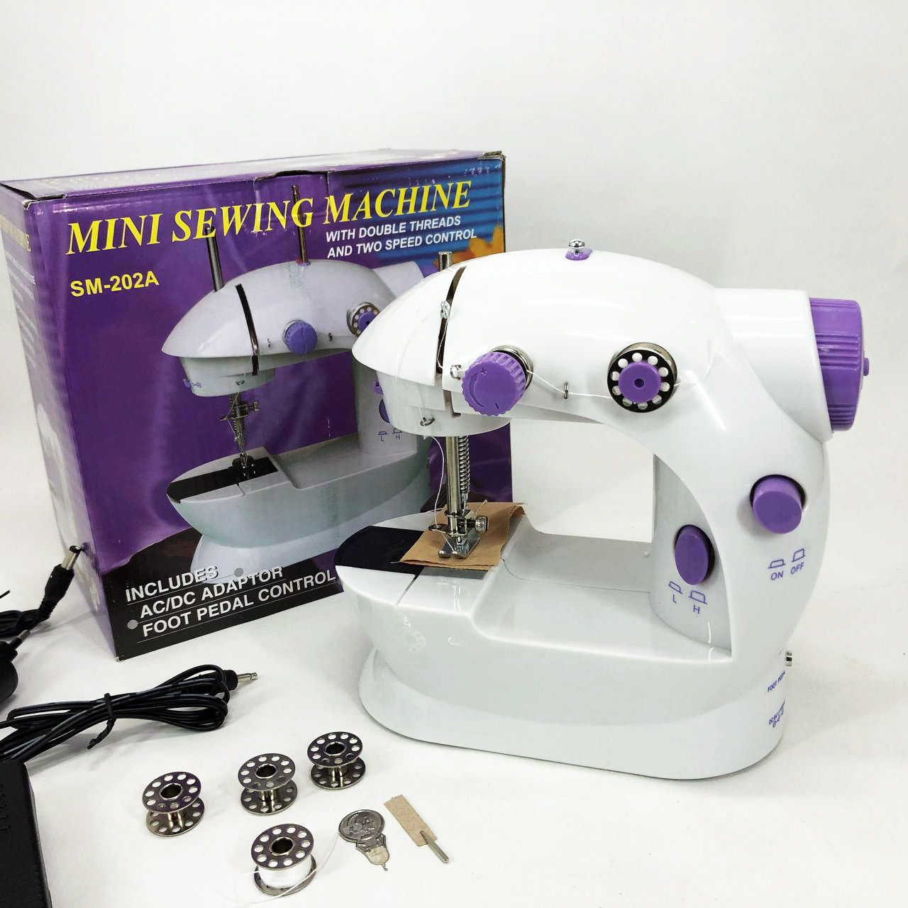 Електрична швейна машинка, Портативна маленька міні-ручна швейна машина машинка ручне керування PL-16, фото 1