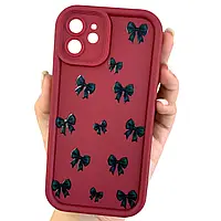 Чохол для iPhone 12 бордовий з принтом з об'ємними бортами чохол з чорними бантиками