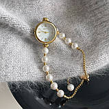 Жіночий кварцовий годинник Rebirth з браслетом золотистого кольору з перлами, фото 2