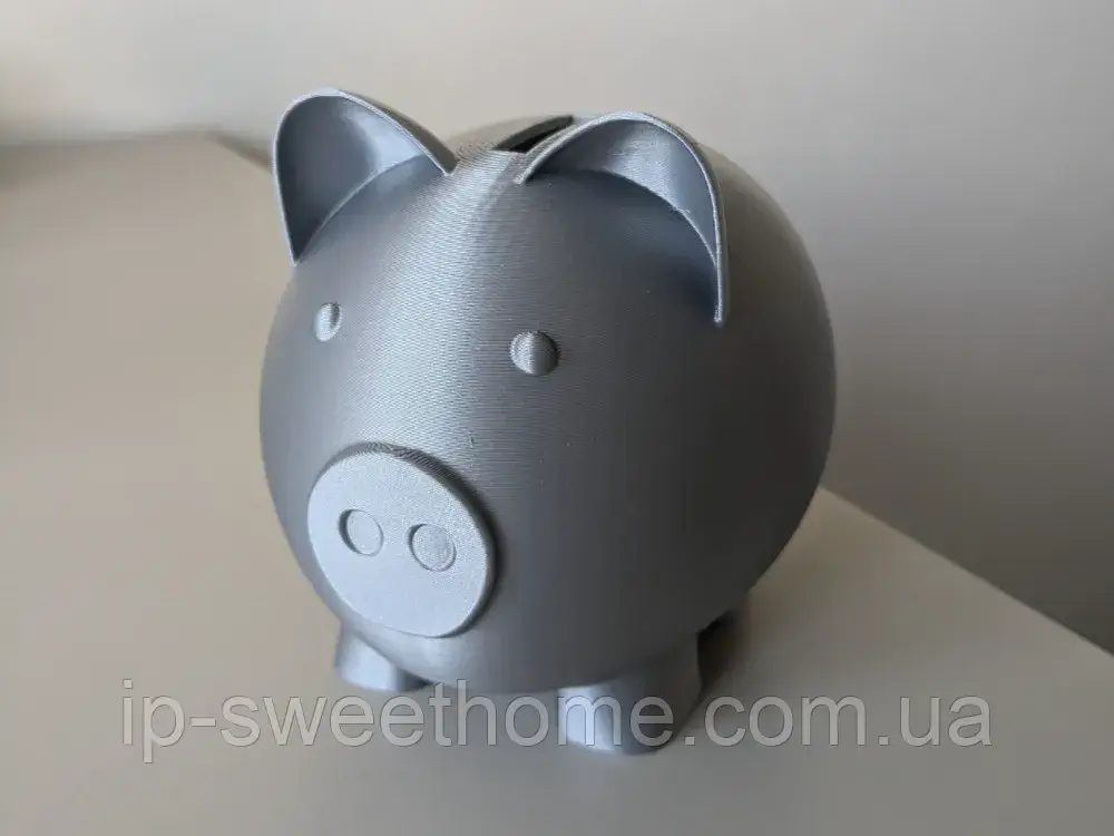 Скарбничка у формі свинки