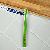 Дитяча зубна щітка Curaprox Kids CS 5500 від 4 до 12 років салатова, 1 шт