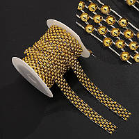 Декоративна стрічка з напівбусин на нитці VX-21. Колір - золотий(за м)