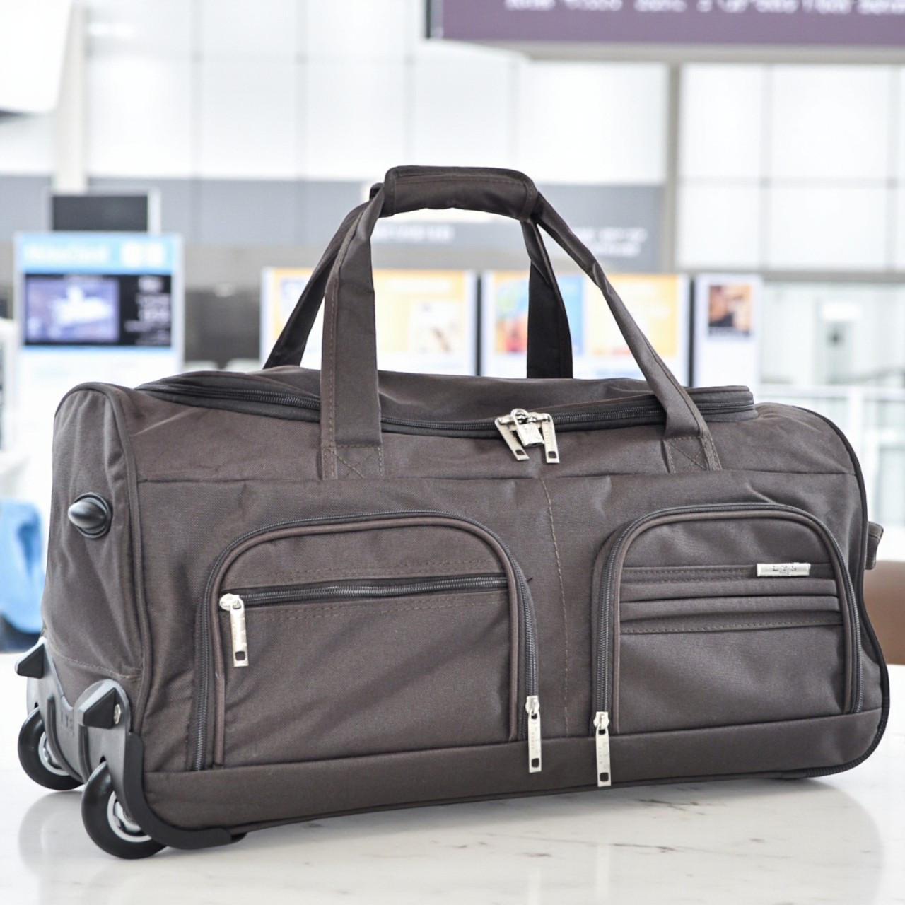 Дорожня містка сумка на колесах 70 л багажна сумка на колесах для подорожей, фото 1