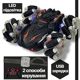 Радіокерована трюкова машинка-перевертень із браслетом керування, USB заряджанням і LED-підсвіткою чорна сині/оранжеві смуги