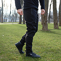 Чоловічі тактичні штани теплі та водостійкі soft shell демісезонні спортивні штани з манжетами на флісі