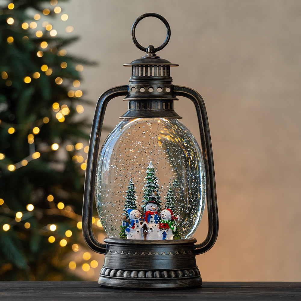 Новорічний ліхтар зі снігом та мелодією "Сім'я сніговичків" працює від батарей у комплекті з USB кабелем висота 22 см, фото 1