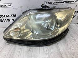Фара ліва Honda City (06-08) OE: p5658