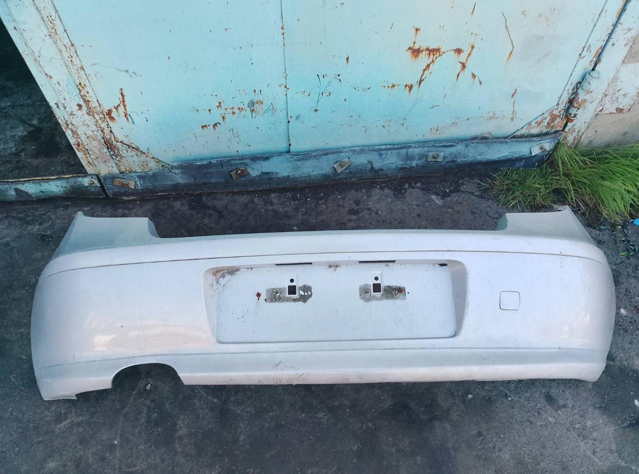 Вітаю зацікавлених на авто розборці Чемпіон !!!<br />
 Предметом оголошення є&nbsp;&nbsp;Бампер задній BMW 1 E81 E87 ресталінг (2004-2011) 7166612<br />
 Фактичний стан на фото. Гарантія 14 днів на встановлення та перевірку<br />
 Висилаємо по всій Україні по передоплаті на транспортні витрати!<br />
 Наявність та асортимент на складі постійно змінюються.<br />
 Точні деталі уточняйте по телефону +380973363743 — фото 1