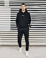 Мужской черный спортивный костюм Adidas зимний на флисе двойка, Утепленный костюм черного цвета с лампасами трехнитка Худи Штаны