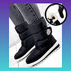 Karolina жіночі дутики чорного кольору з білою підошвою та хутром на липучках