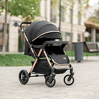 Прогулянкова коляска Ninos Maxi 2 (Нінос Максі) Black gold (чорний колір) з перекидною ручкою