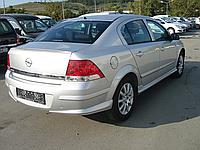 Спідниця на задній бампер під фарбування на Opel Astra H sd 2004-2010 Накладка на задній бампер Опель Астра Ейч Седан