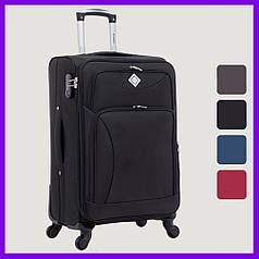 Дорожня тканинна валіза на колесах Bonro Tourist M середня чорна з кодовим замком і висувною ручкою